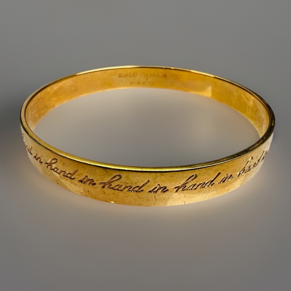Kate Spade “Hand and Hand” inscribed Goldtone Bangle Bracelet - Picture 10 of 15